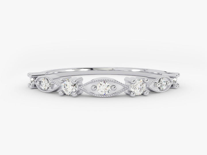 Round diamond band stacked with engagement ring