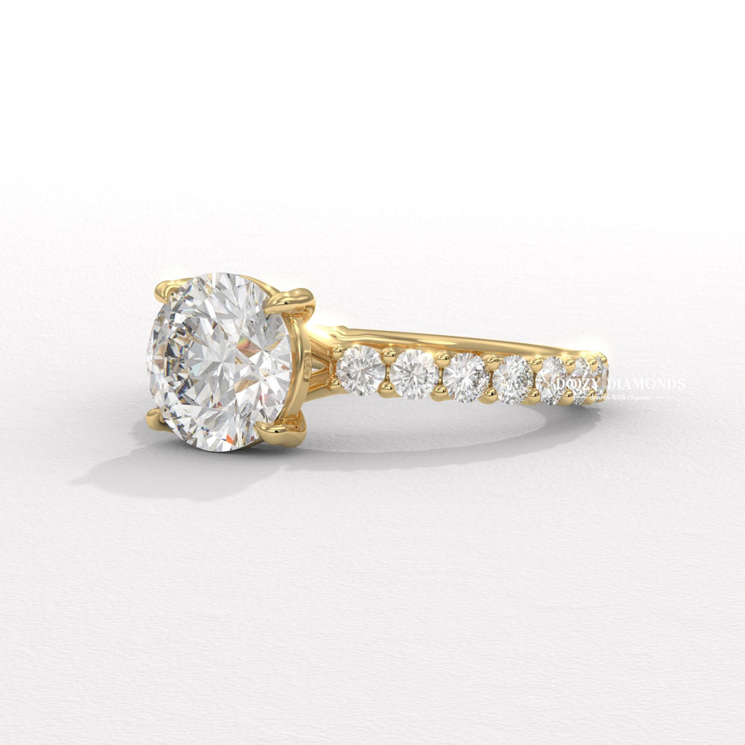 Round solitaire lab grown diamond ring fitted on finger