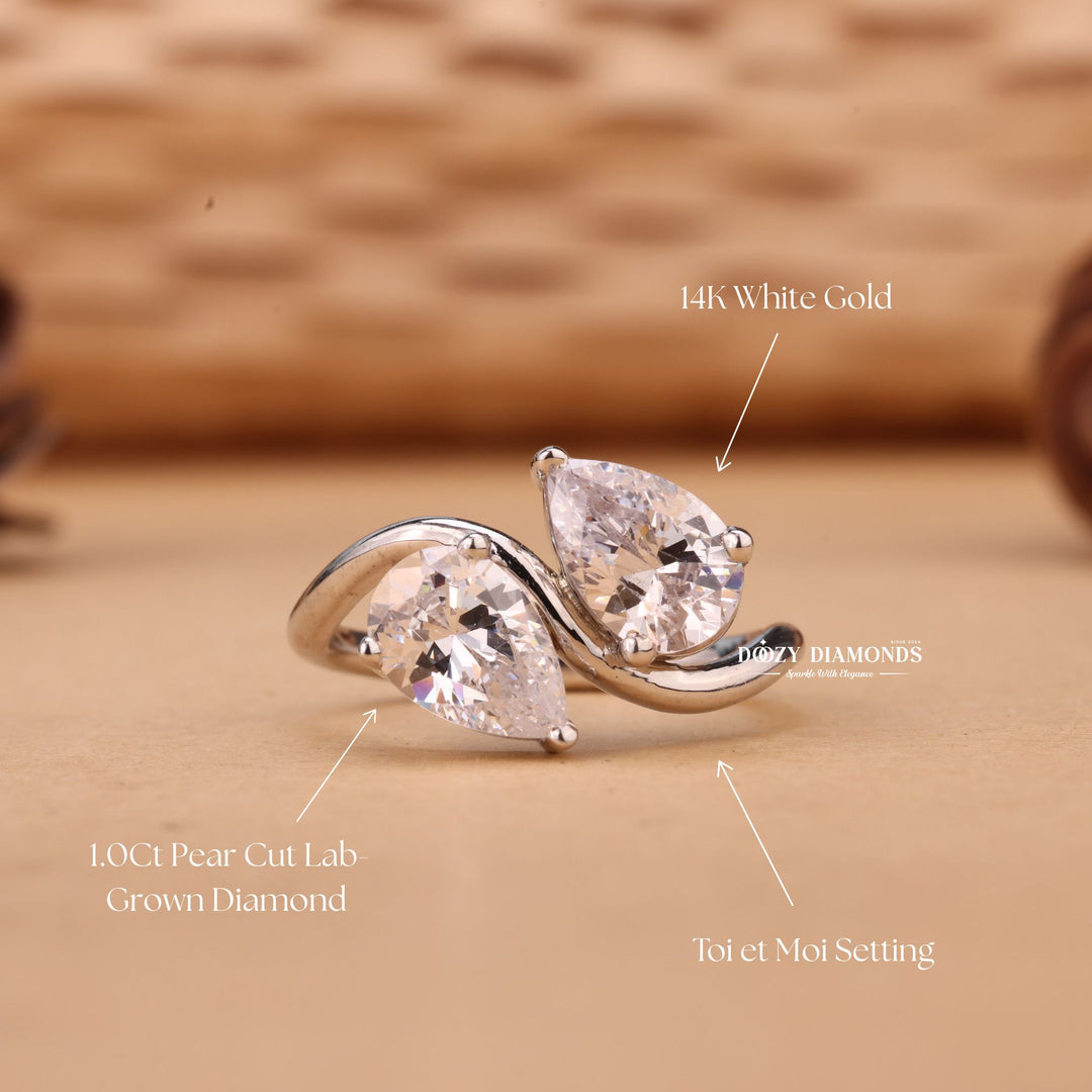 Pear solitaire lab grown diamond ring fitted on finger