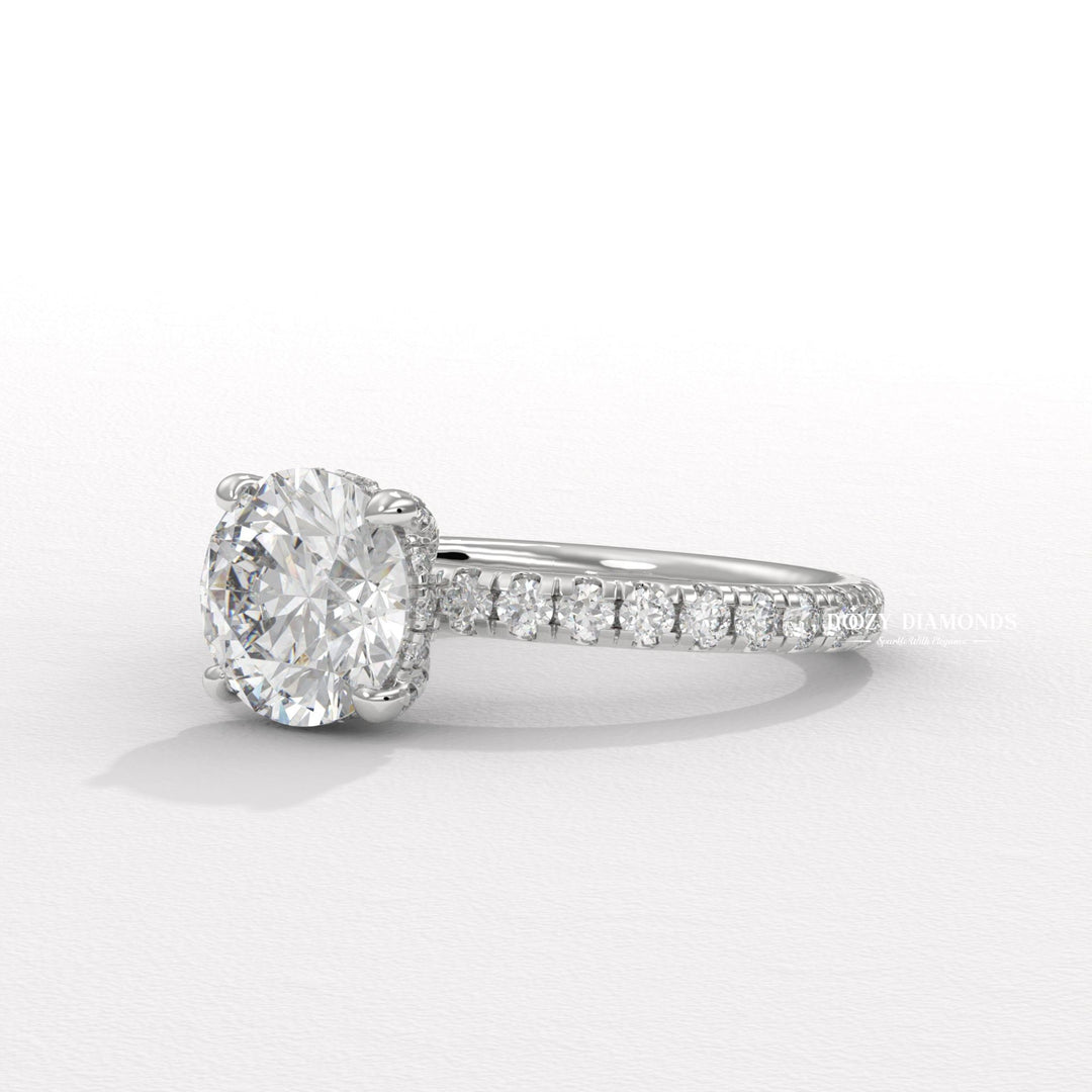 Round hidden halo engagement ring close-up showing high clarity diamond clarity