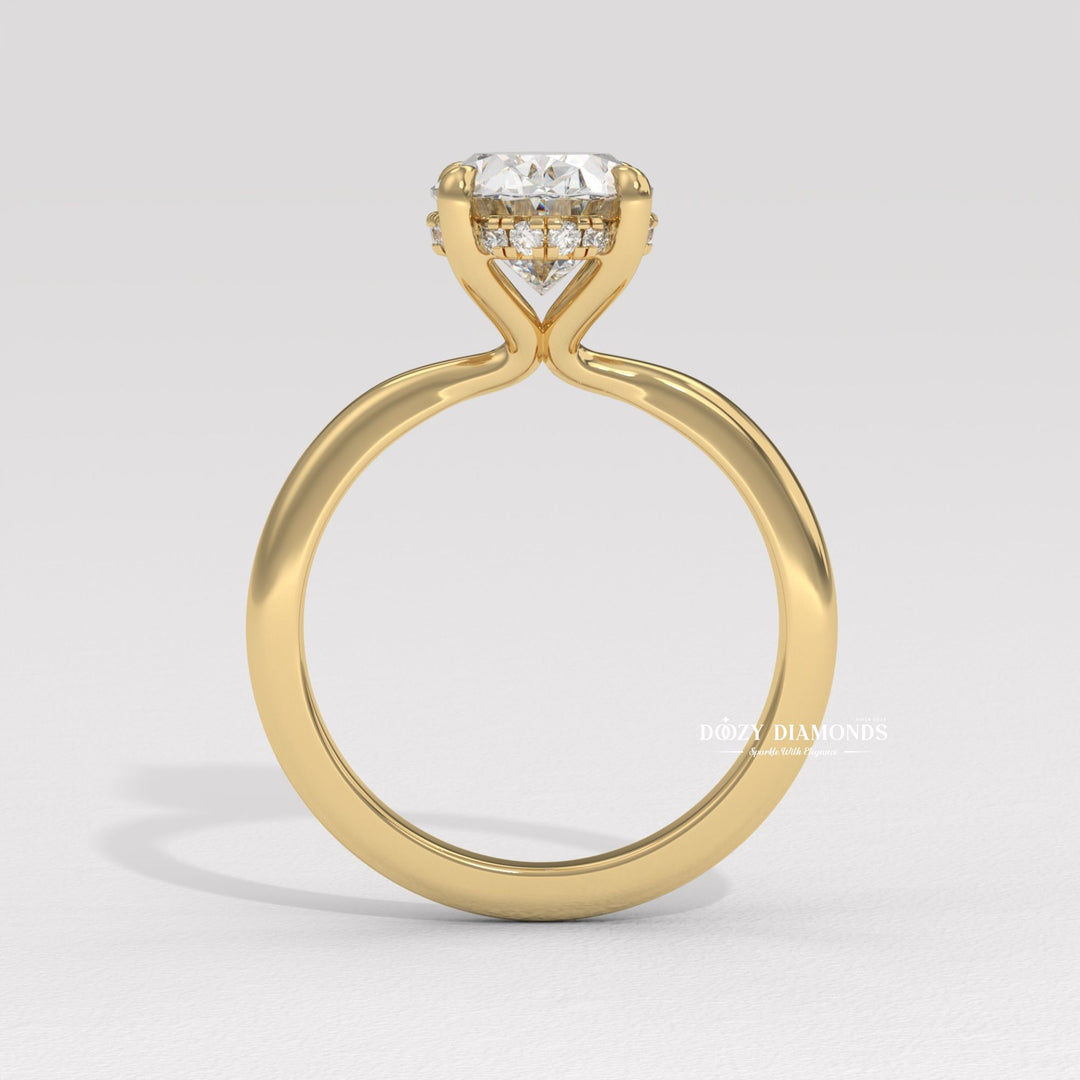 Side angle of oval solitaire diamond engagement ring