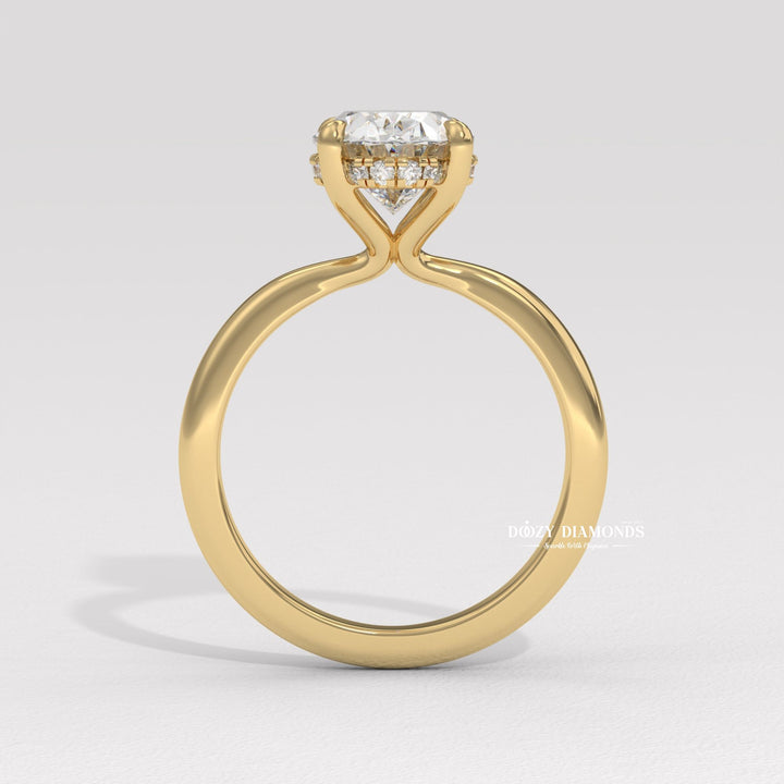 Side angle of oval solitaire diamond engagement ring