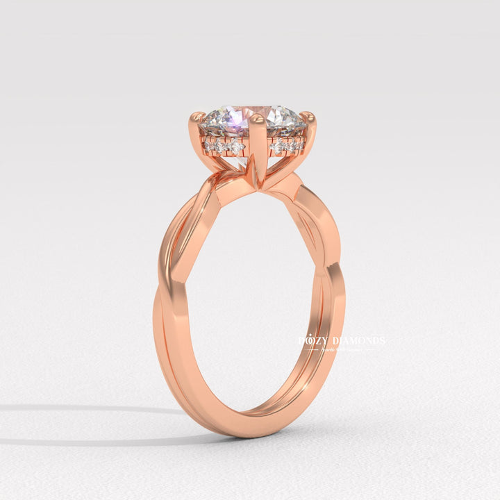 Fine craftsmanship detail on round solitaire engagement ring