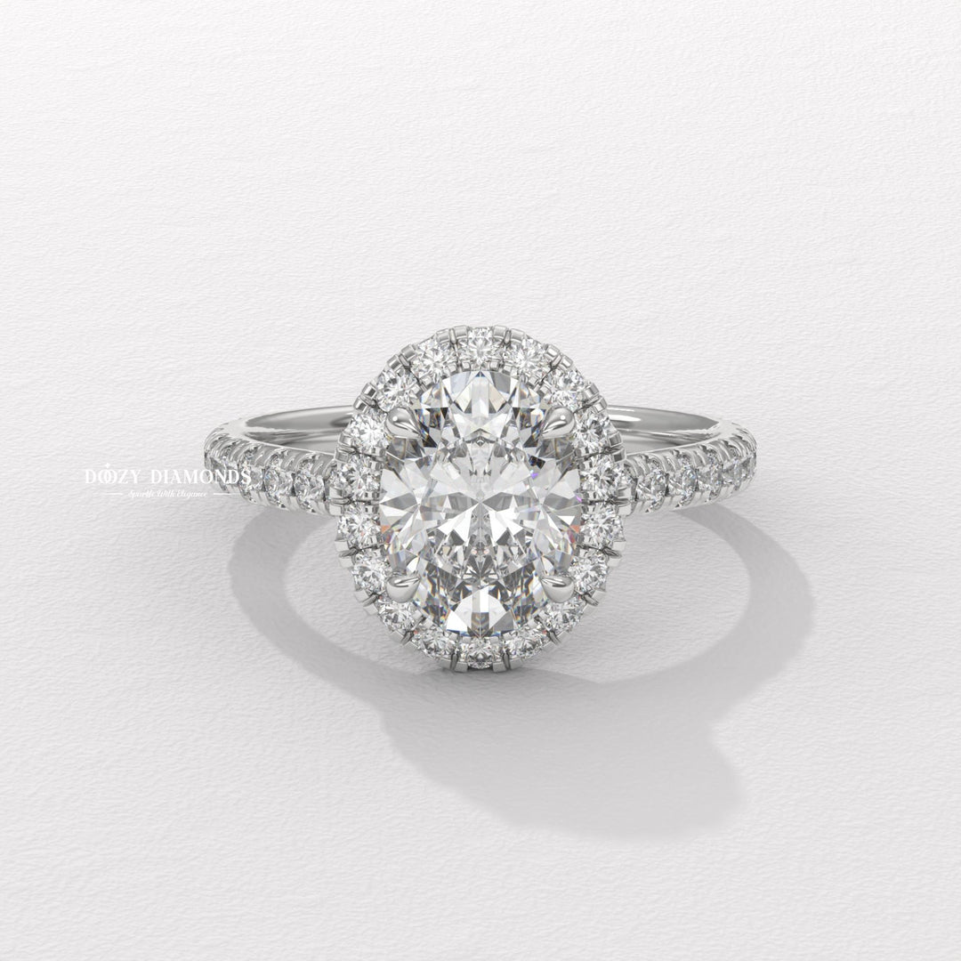 Oval cut halo engagement ring with IGI certified center diamond