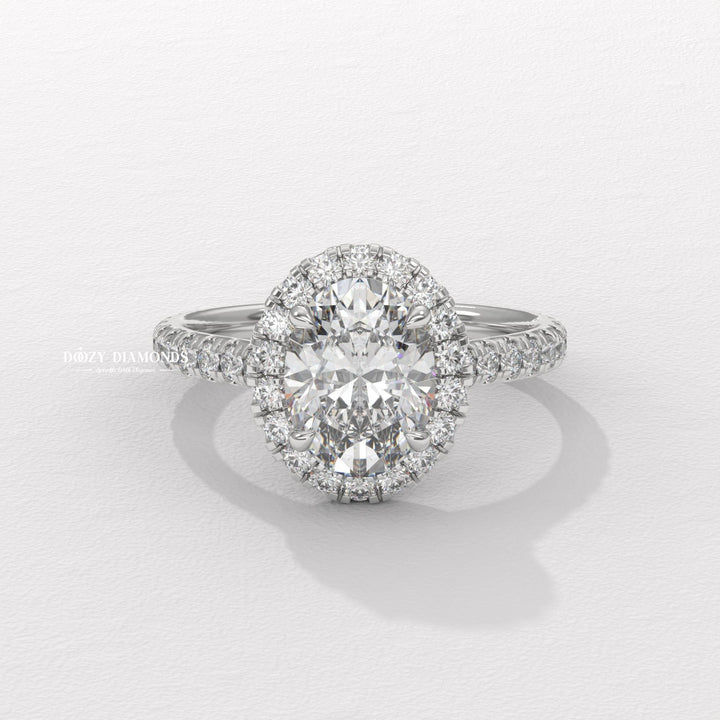 Oval cut halo engagement ring with IGI certified center diamond