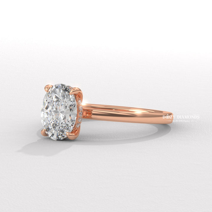 Oval cut solitaire engagement ring shown in real-life wear