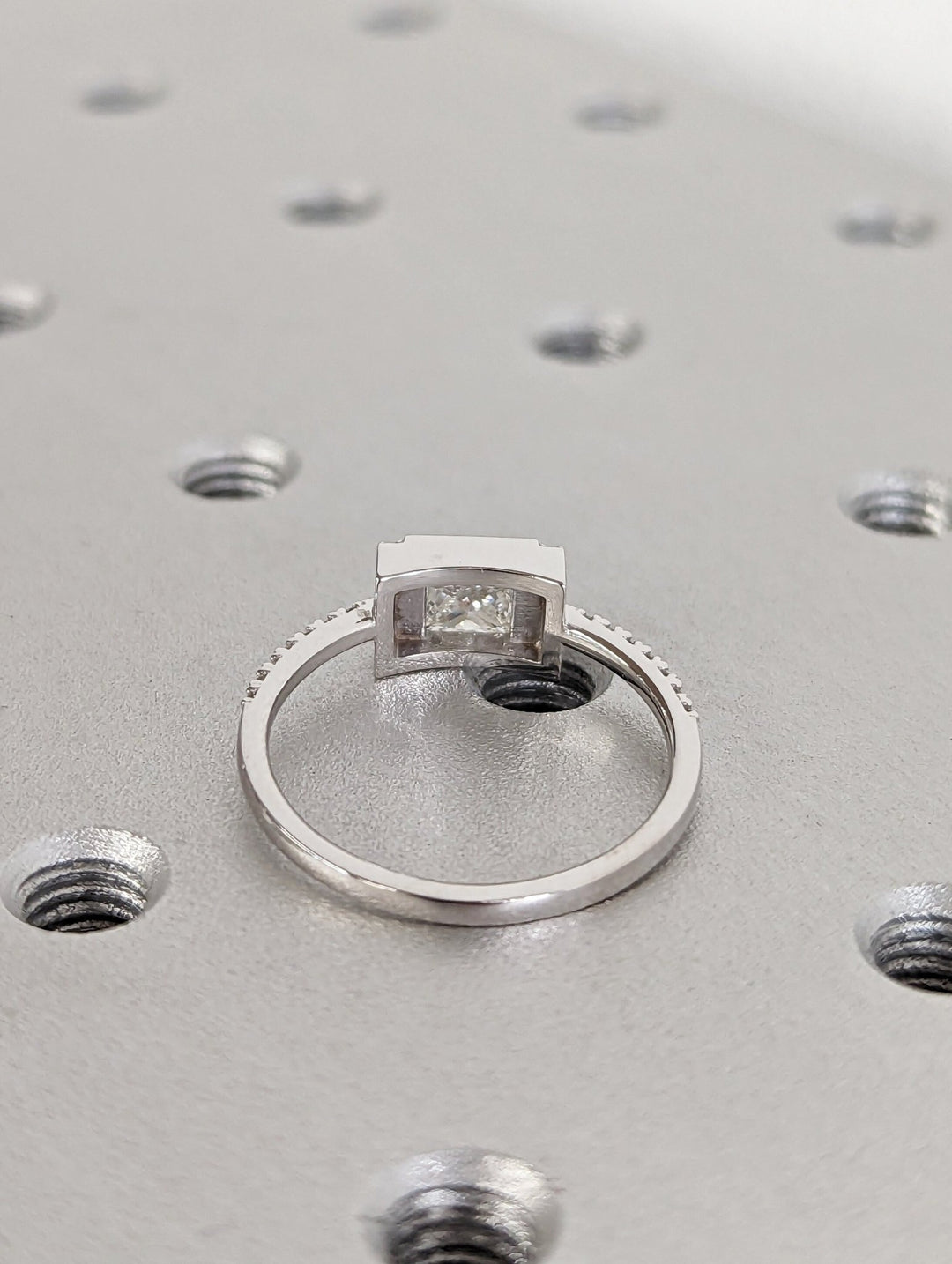 Princess pave ring set with an IGI graded diamond