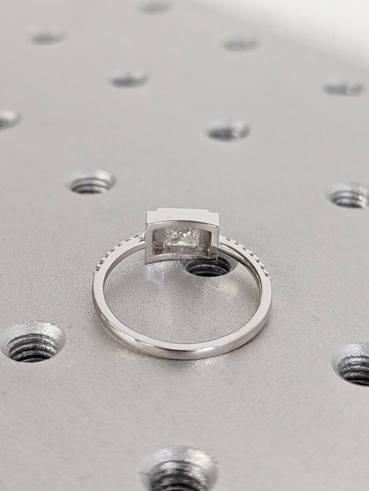 Princess pave ring set with an IGI graded diamond