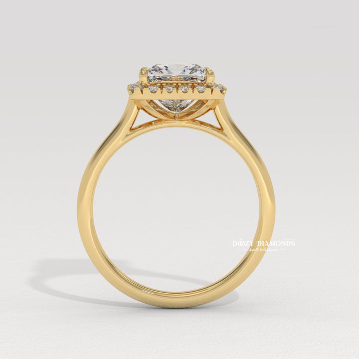 Princess solitaire engagement ring finished in polished solid gold