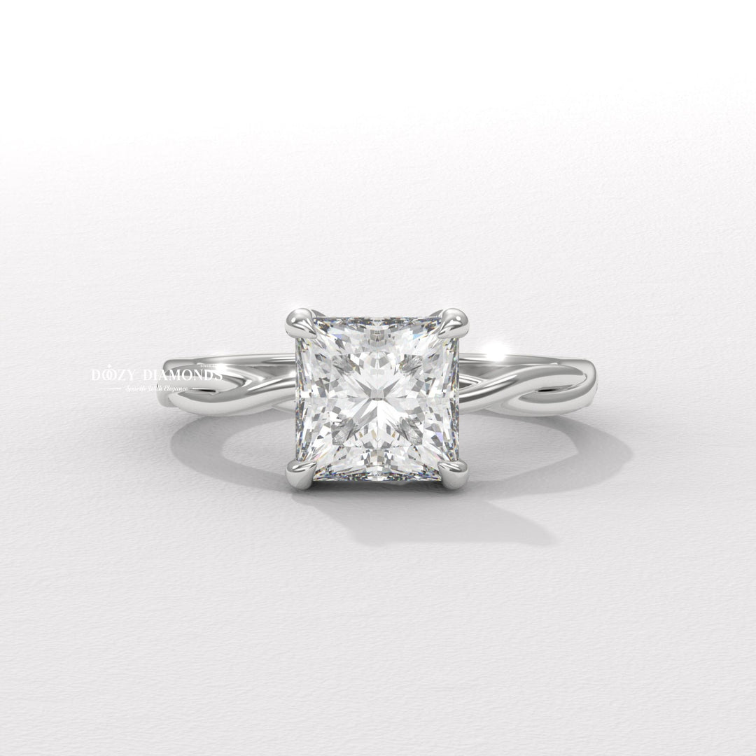 Side angle of princess solitaire diamond engagement ring