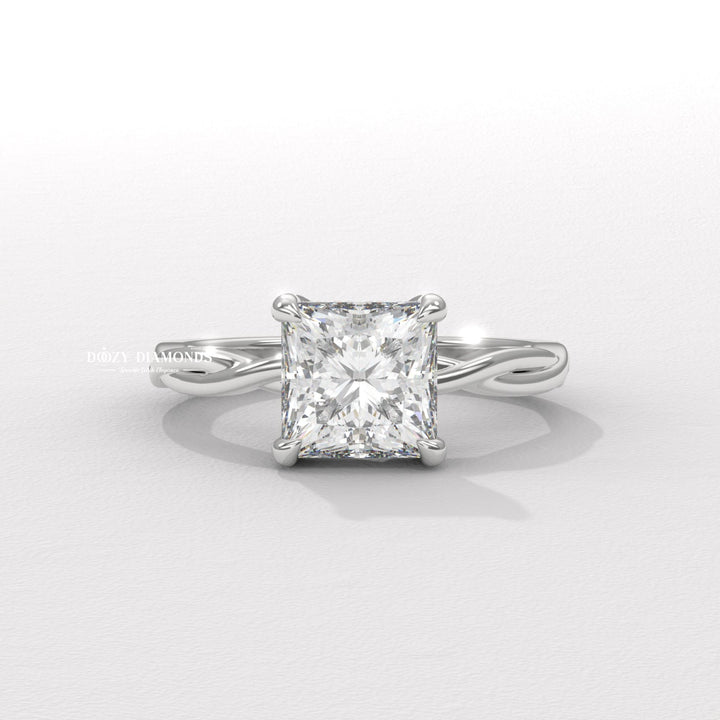 Side angle of princess solitaire diamond engagement ring