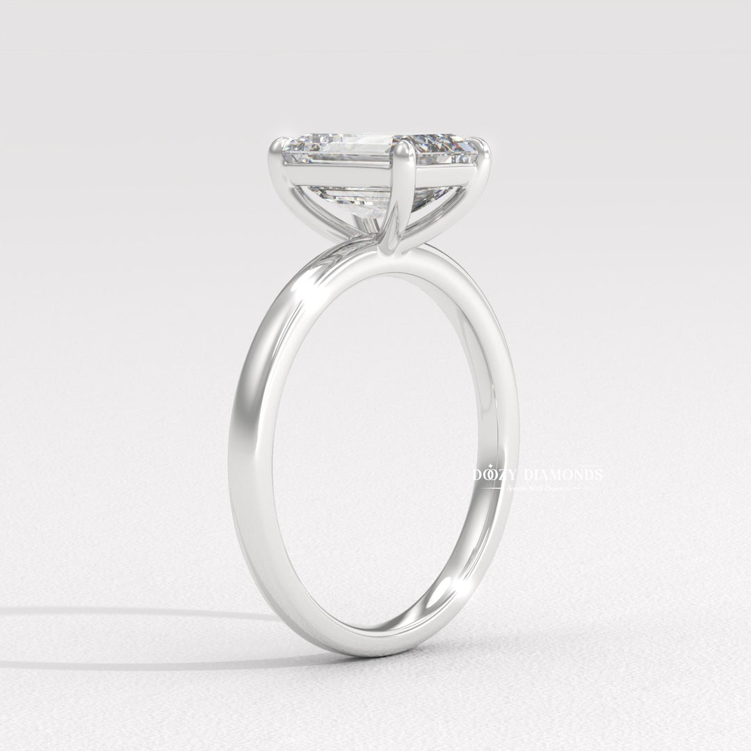 Top-down view of emerald cut solitaire engagement ring