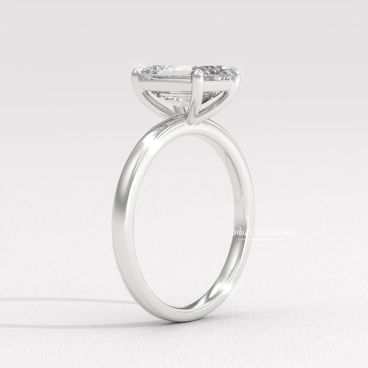 Top-down view of emerald cut solitaire engagement ring