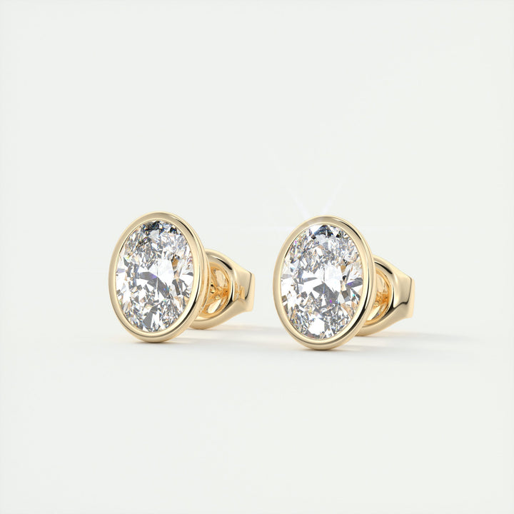 1-0-ct-oval-bezel-solitaire-cvd-f-vs-diamond-earrings