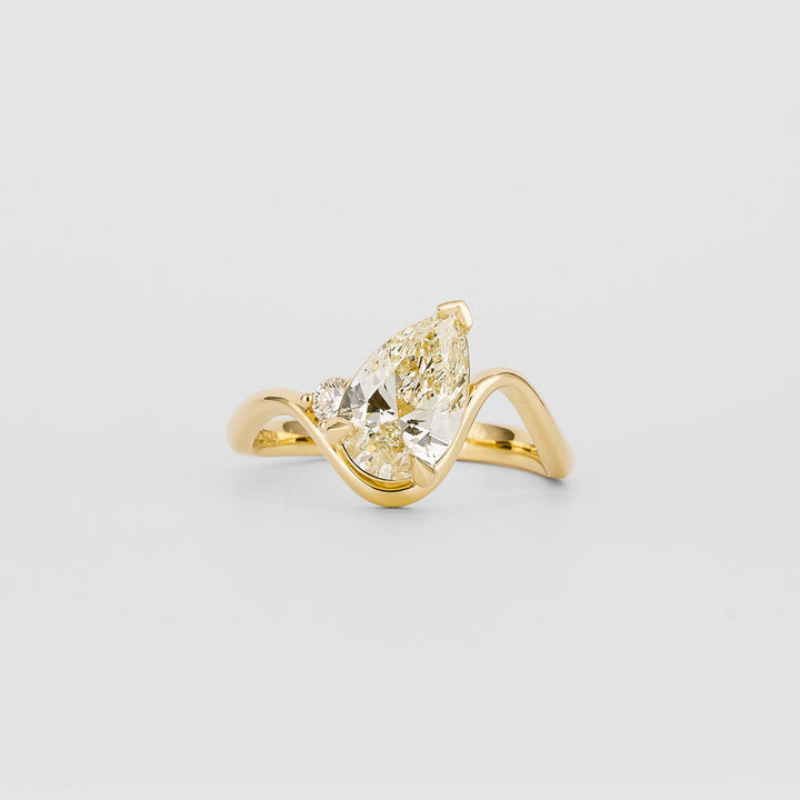 Side angle of pear solitaire diamond engagement ring