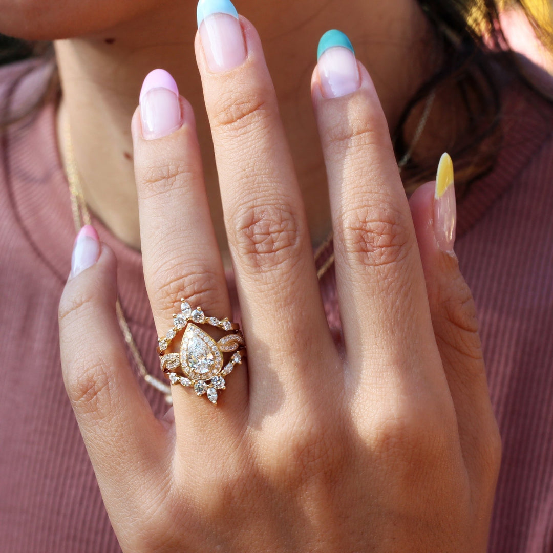 Pear cut engagement ring side view showing band detail