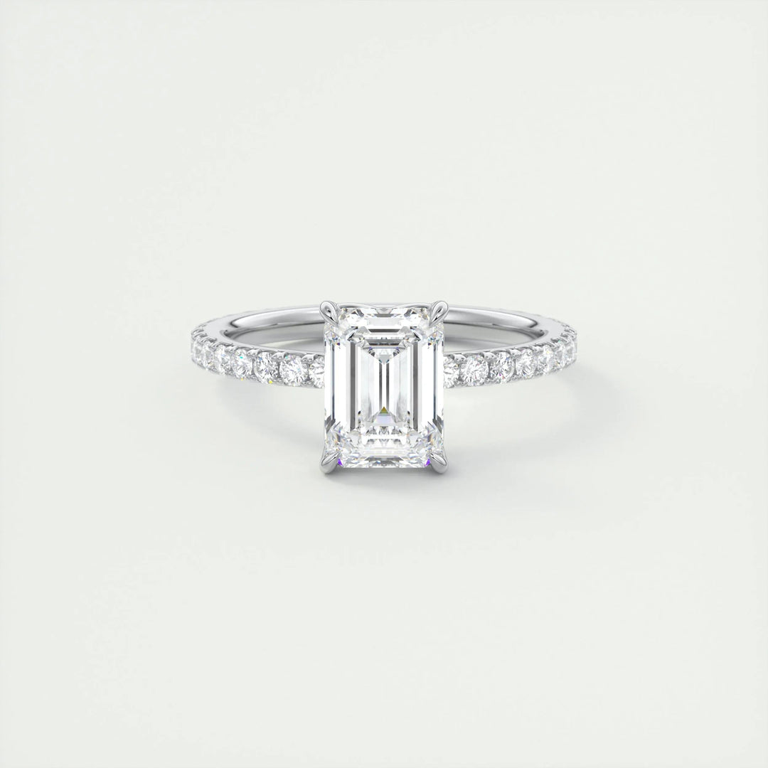Emerald pave engagement ring close-up showing F-/VS1 diamond clarity