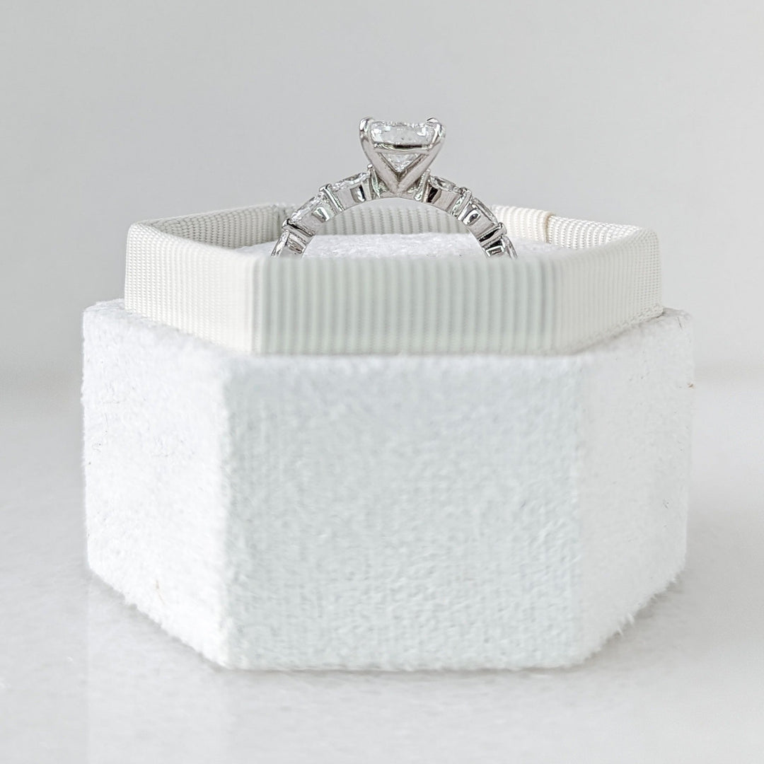 Unboxing view of cushion cut pave diamond engagement ring