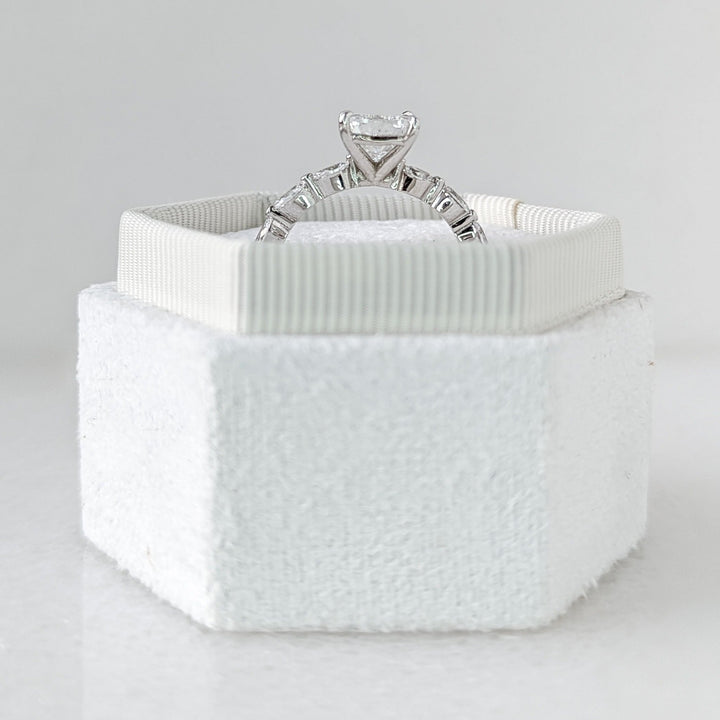 Unboxing view of cushion cut pave diamond engagement ring