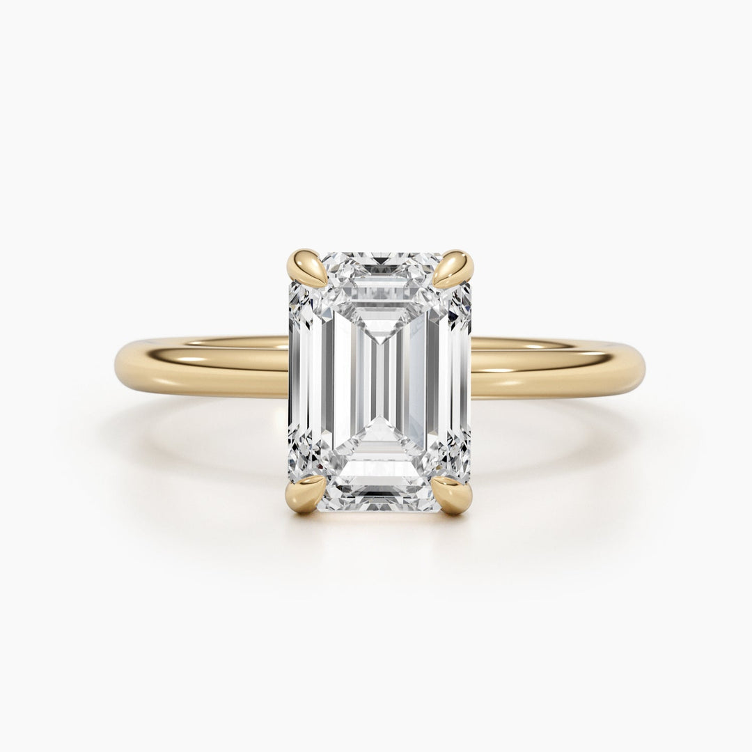 Macro shot of emerald cut diamond facets in solitaire ring setting