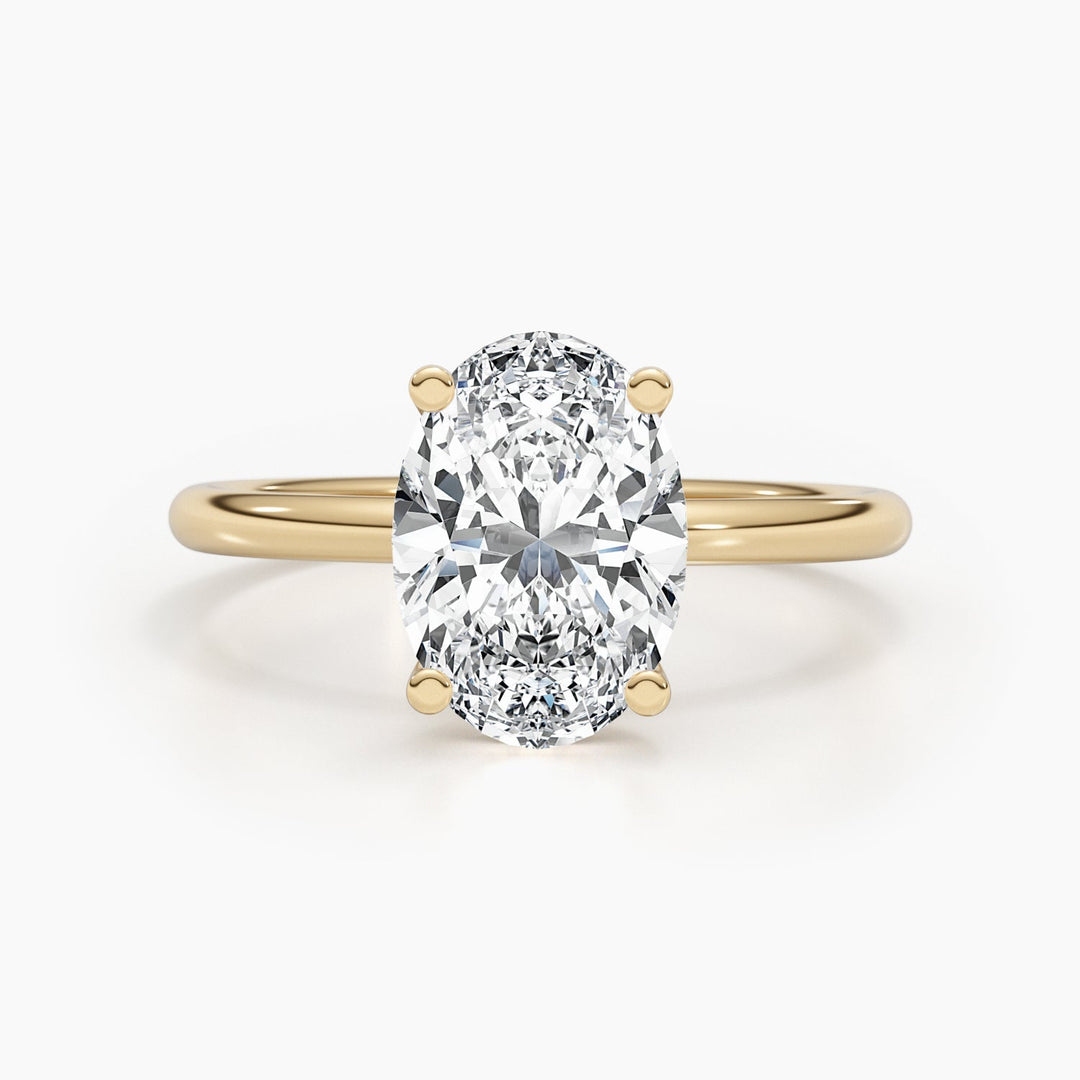 Premium oval cut hidden halo engagement ring crafted in solid gold