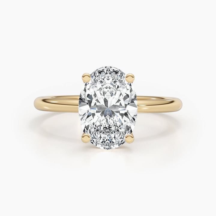 Premium oval cut hidden halo engagement ring crafted in solid gold