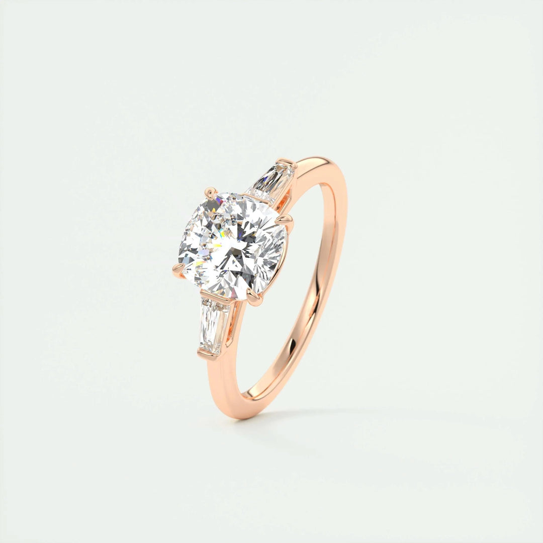 Cushion three stone engagement ring photographed in natural light