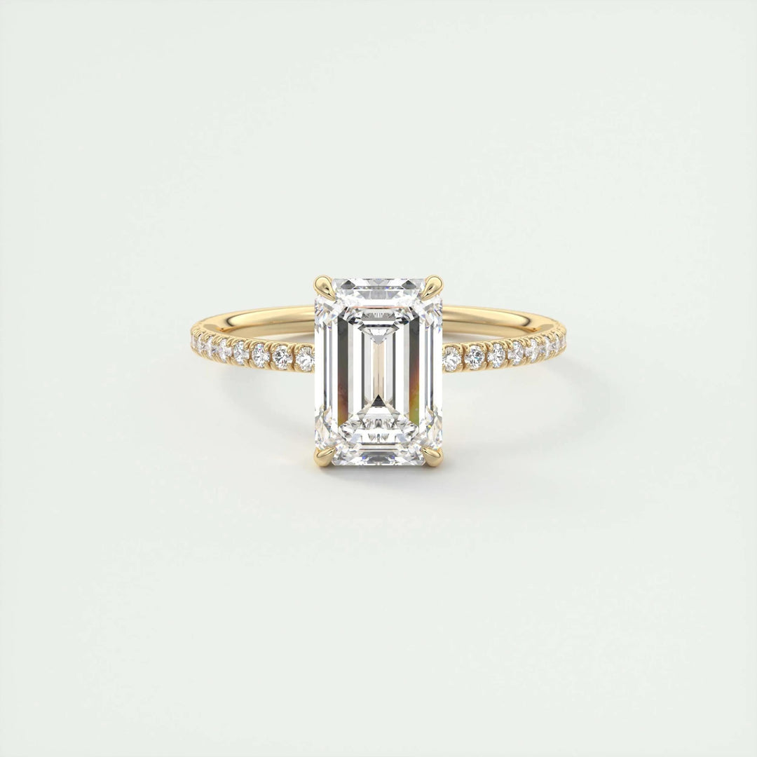 Fine craftsmanship detail on emerald pave engagement ring