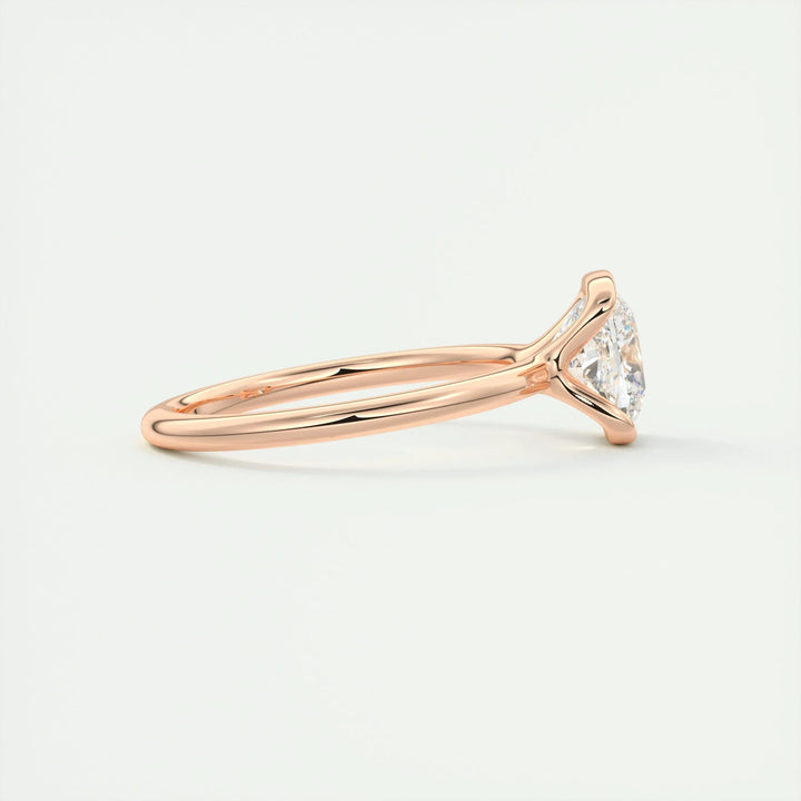 Detailed close-up of cushion solitaire diamond engagement ring