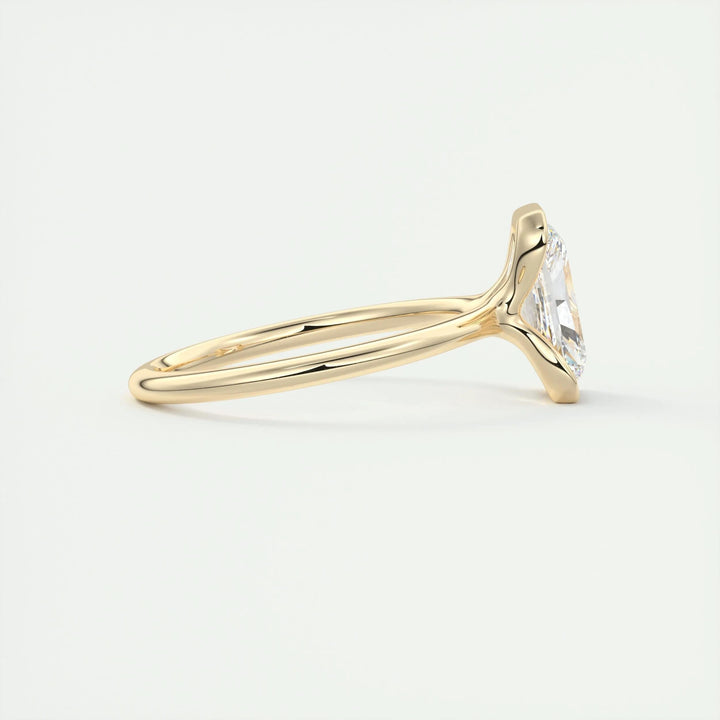 Close-up of radiant cut center diamond in solitaire engagement ring