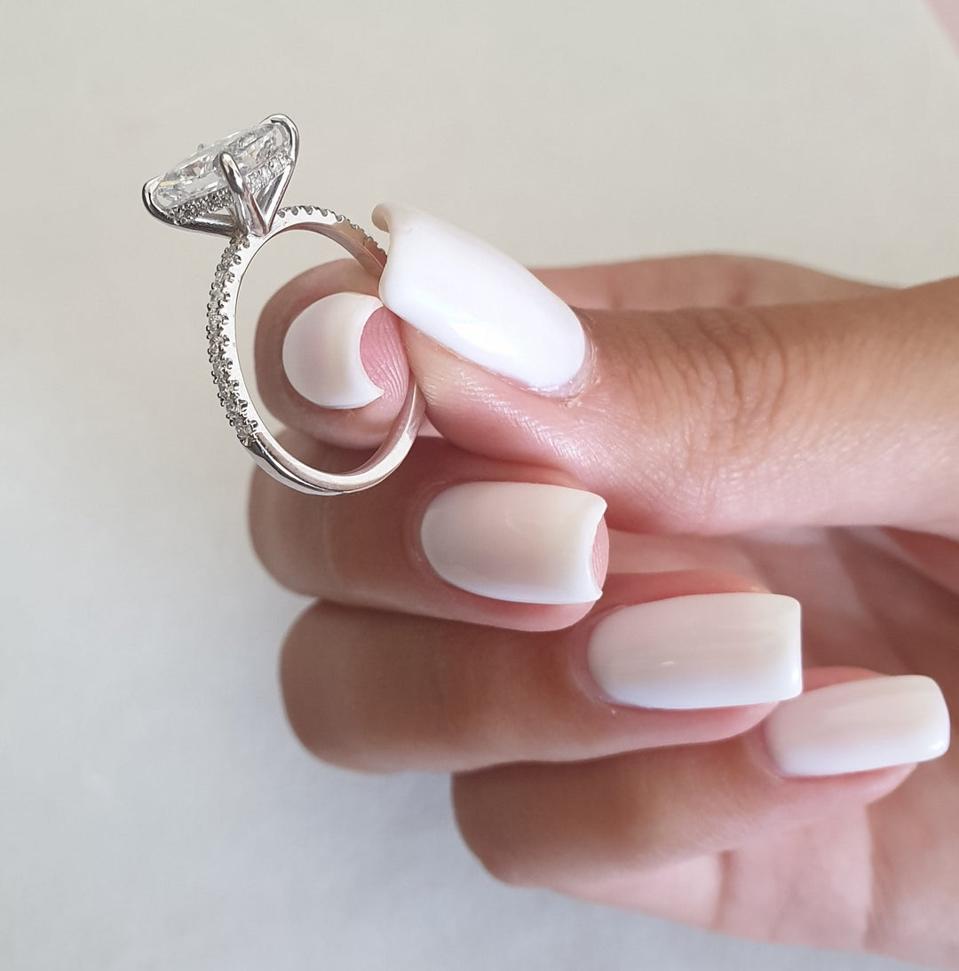 Premium radiant cut hidden halo engagement ring crafted in solid gold