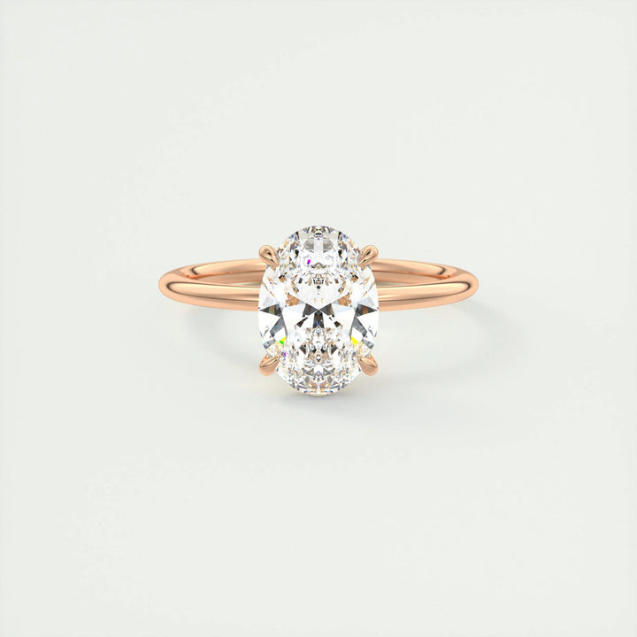 Oval solitaire ring set with an IGI graded diamond
