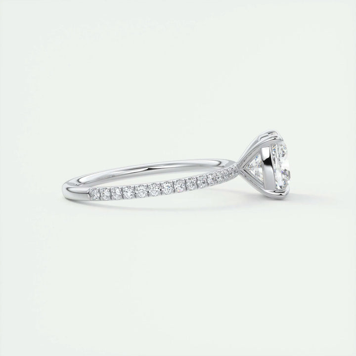 Cushion cut pave engagement ring shown in real-life wear