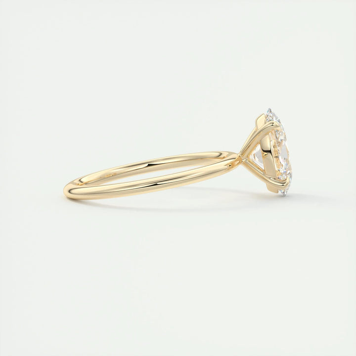 Oval cut solitaire engagement ring shown in real-life wear