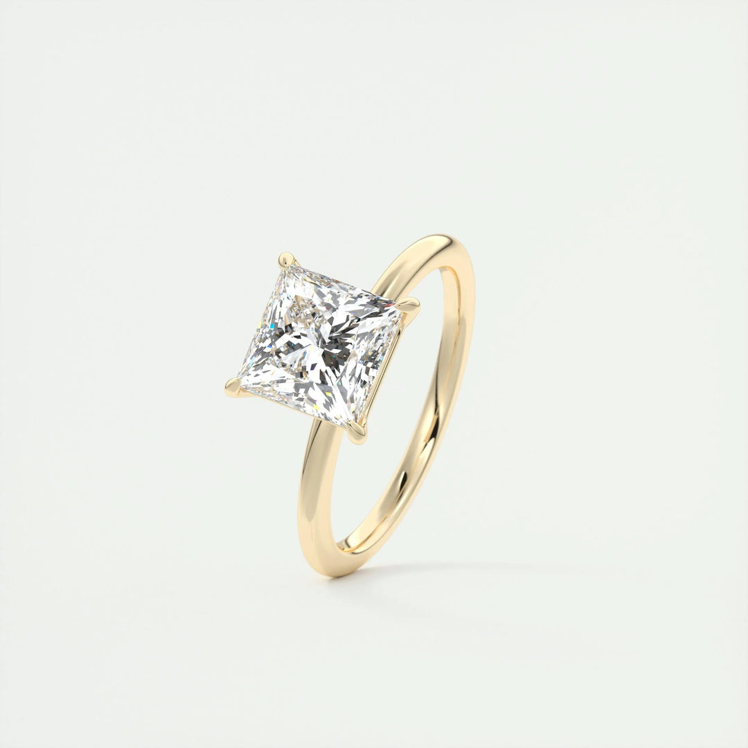 Princess solitaire engagement ring shown on hand for true-to-life sizing
