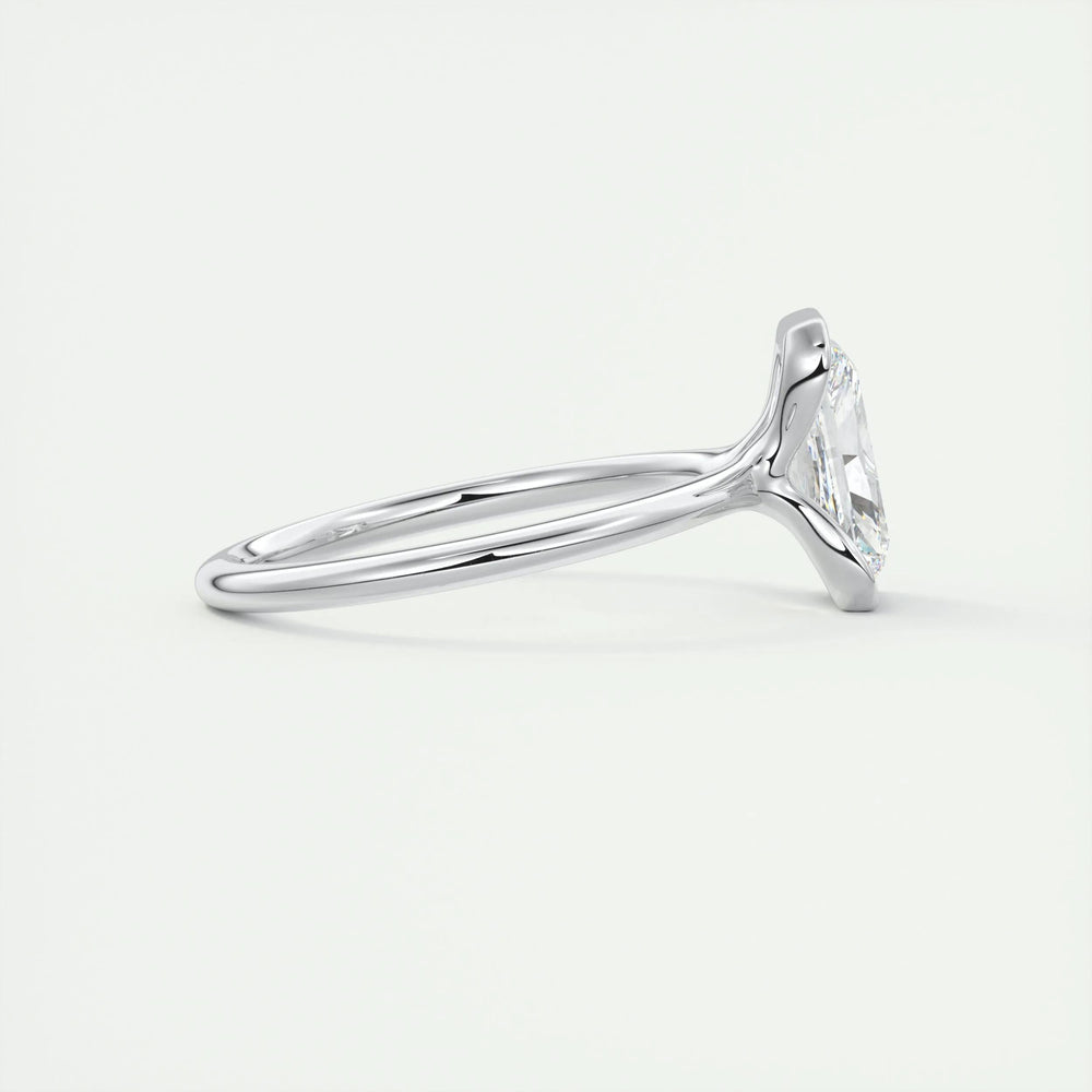 Radiant solitaire engagement ring photographed in natural light
