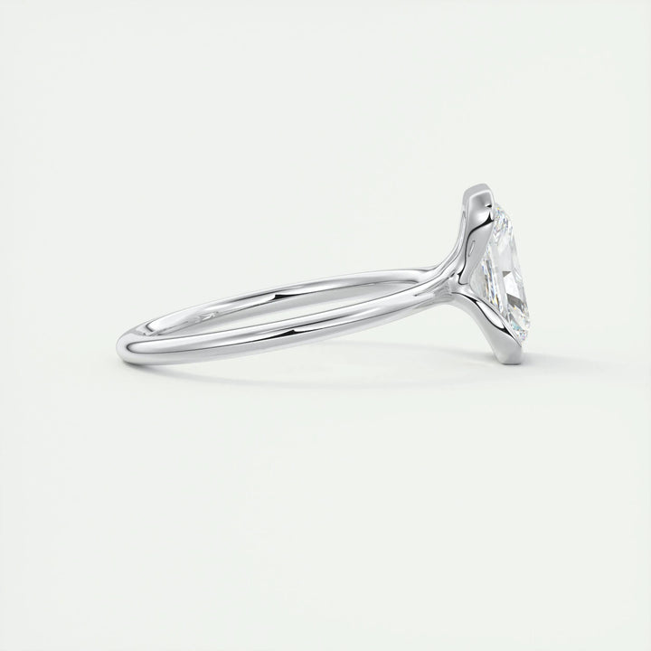 Radiant solitaire engagement ring photographed in natural light