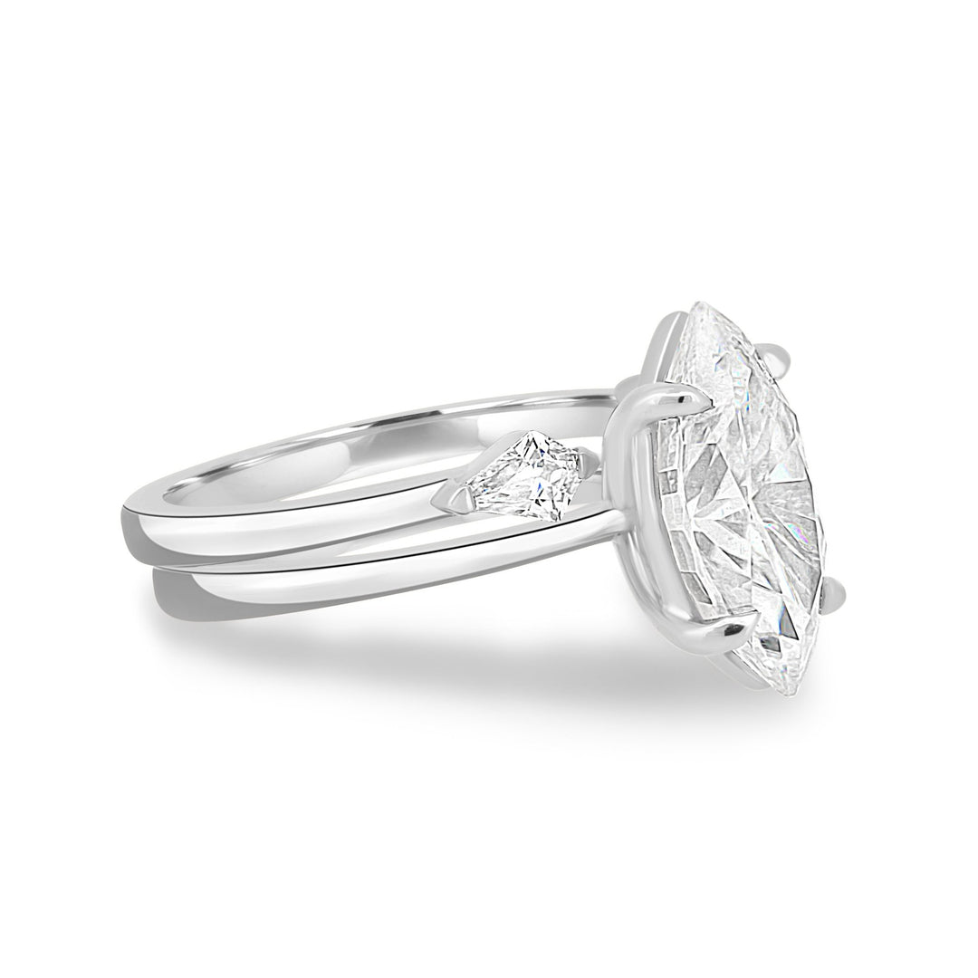 Marquise solitaire diamond engagement ring available in multiple metals