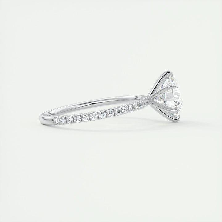 Unboxing view of round cut pave diamond engagement ring