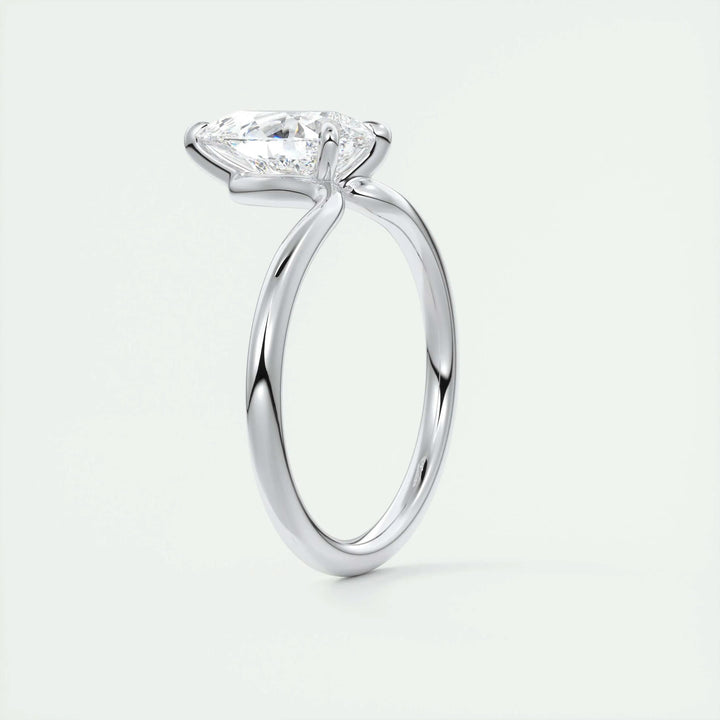 Angled view of pear cut diamond in solitaire setting