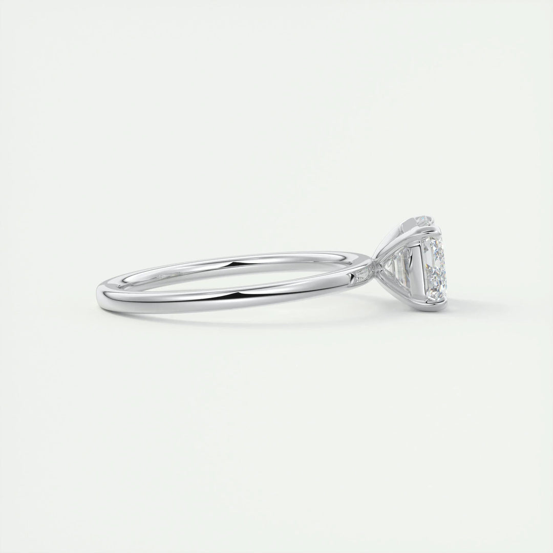 Emerald east west lab grown diamond ring fitted on finger