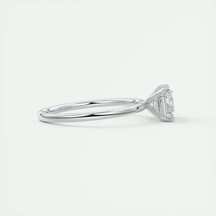 Emerald east west lab grown diamond ring fitted on finger