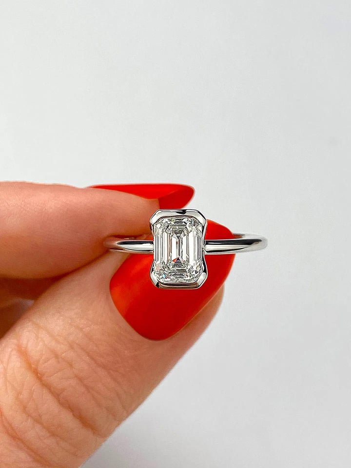 Premium emerald cut solitaire engagement ring crafted in solid gold