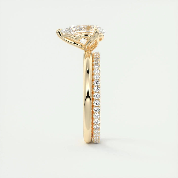 Pear solitaire engagement ring photographed in natural light