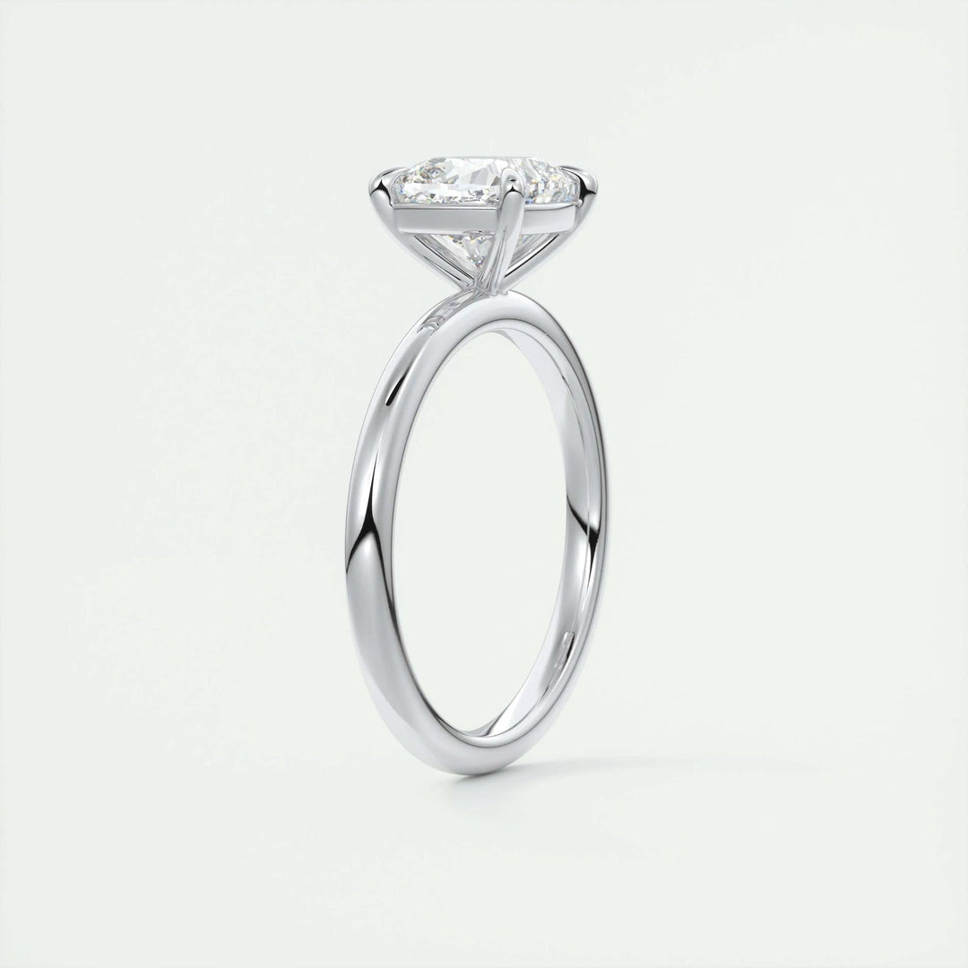 Cushion solitaire diamond engagement ring available in multiple metals