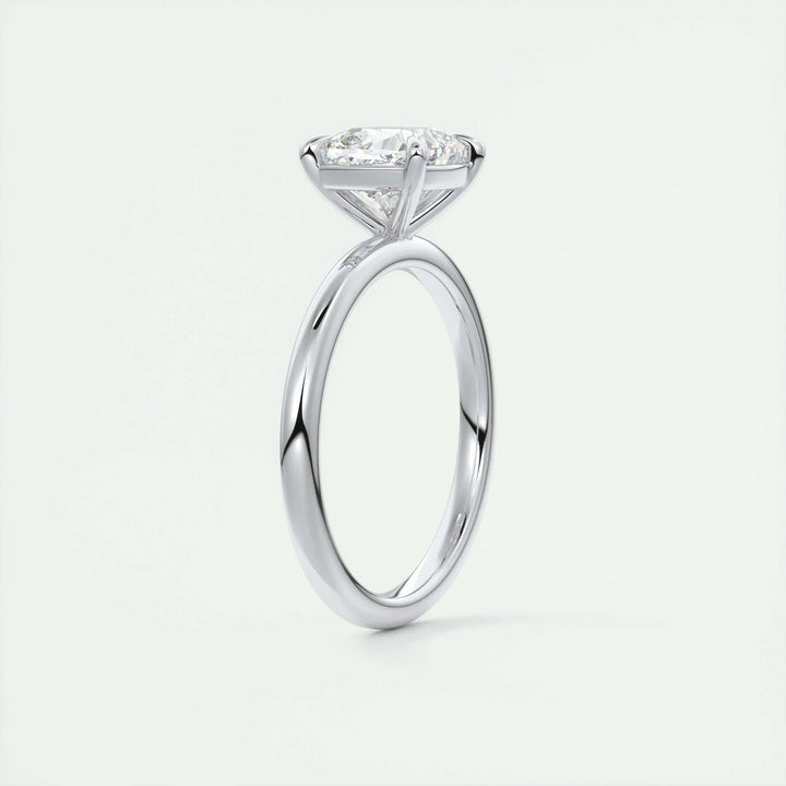 Cushion solitaire diamond engagement ring available in multiple metals