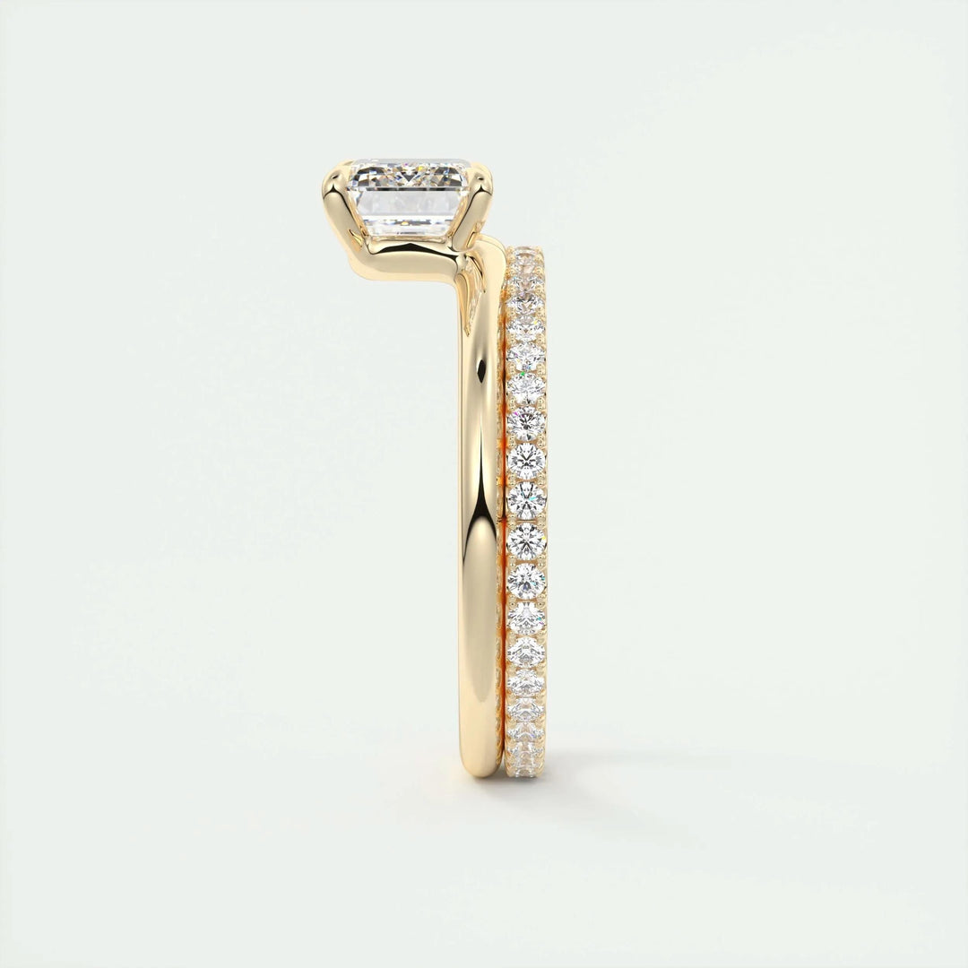 Emerald cut solitaire engagement ring shown in real-life wear