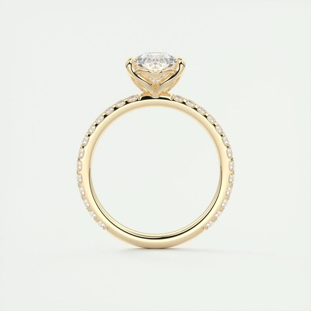Pear pave diamond ring displayed on jewelry stand