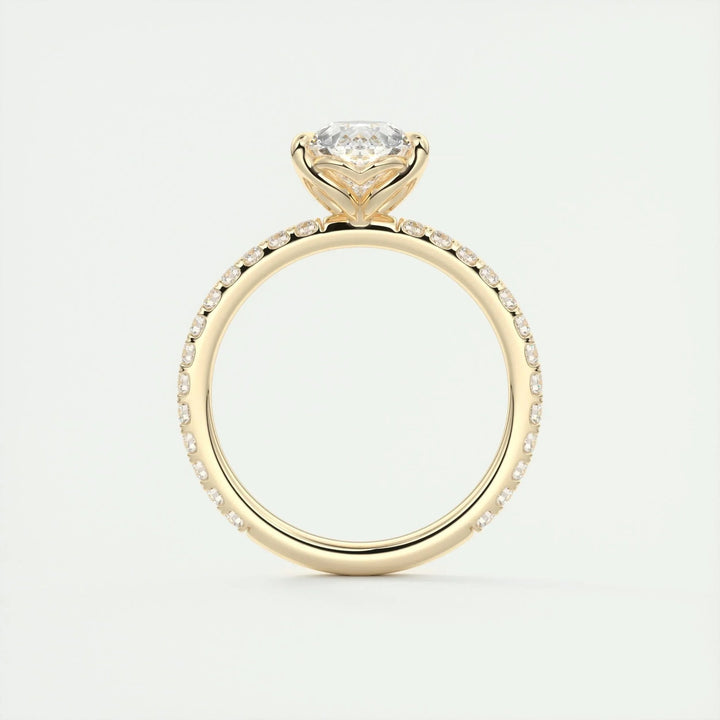 Pear pave diamond ring displayed on jewelry stand