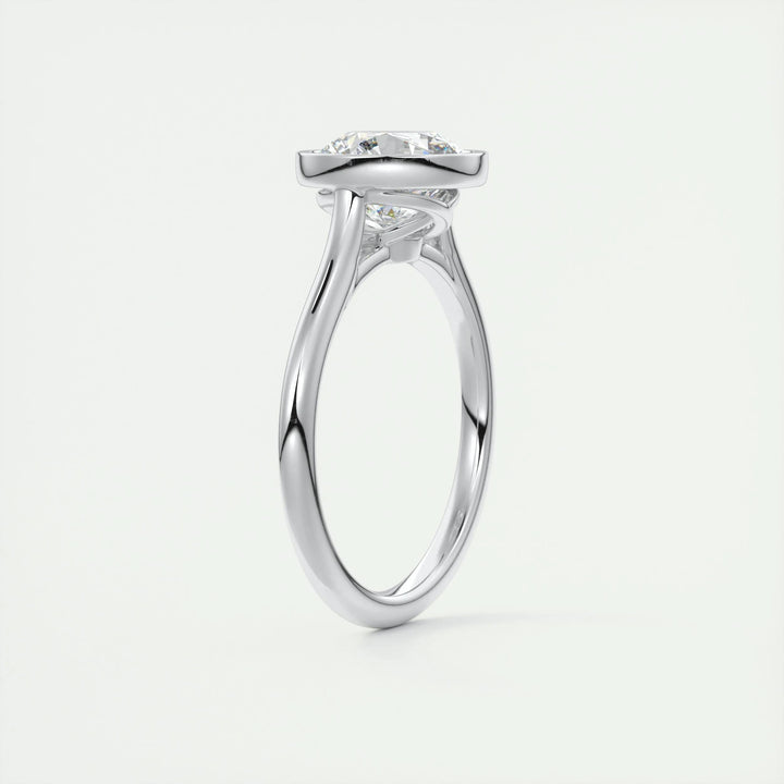 Angled view of round cut diamond in bezel setting